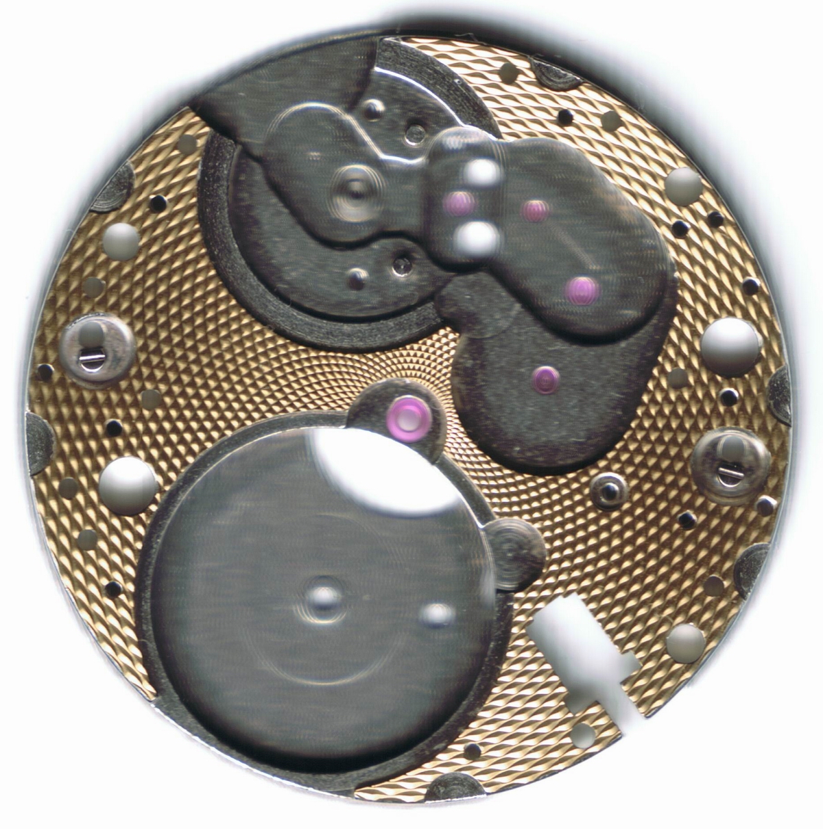 Guilloche realise sur un tour a guillocher, technique artisanale maitrisee par Voutilainen pour ses cadrans